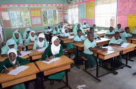 Children in class taking lessons at Zamzam IPS.